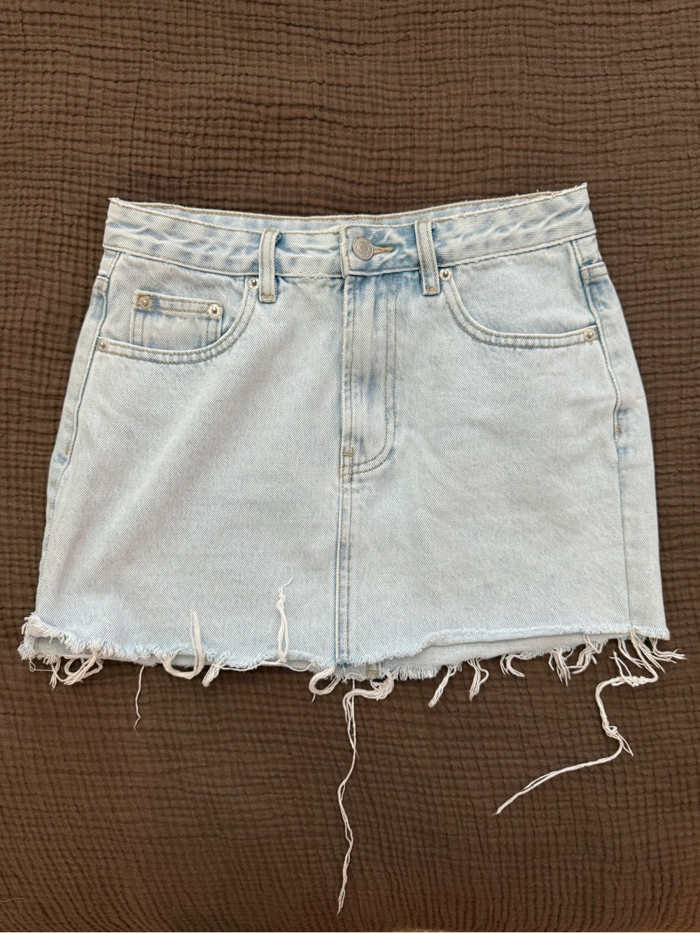 Meshki Light Wash Denim Mini Skirt with Raw Hem